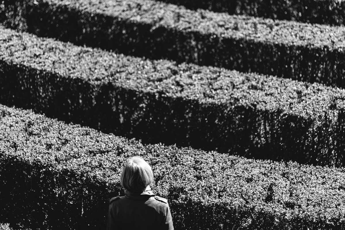 A woman in a maze.